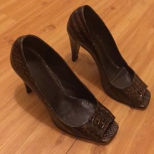 Brown and black animal skin heels